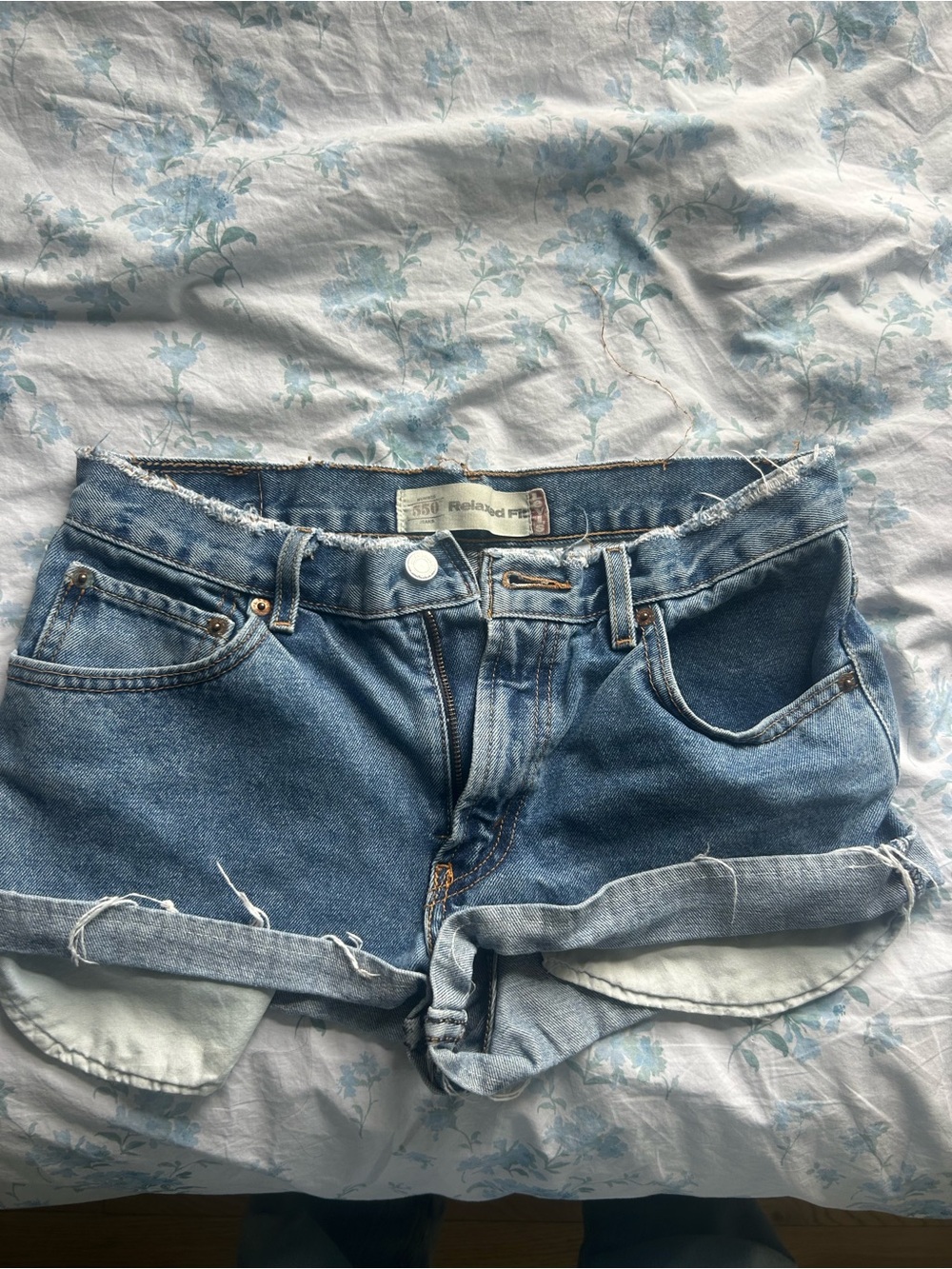 Levi's Medium Blue Distressed Denim Cutoff Shorts